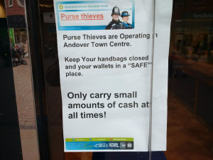 Image of police "warning" on the perils of carrying "too much" cash.